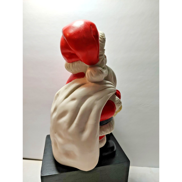 Santa Ceramic w/ Present Coin Bank 8" tall-6"wide-5" long Stopper FLAW CHIP HAT - Picture 2 of 6
